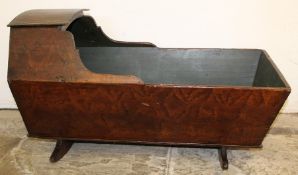 19th century child's pine cot on rocking base with scumbled finish
