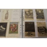 Ring binder containing mixed trade cards & postcards including Bairnsfather