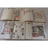 4 stamp albums containing UK and World stamps