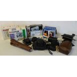 Selection of cameras including Minolta Vectis 25, Kodak Instamatic, Polaroid Supercolor 600,