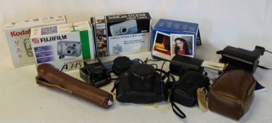 Selection of cameras including Minolta Vectis 25, Kodak Instamatic, Polaroid Supercolor 600,