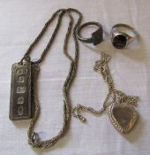 Selection of silver jewellery inc 2 rings, ingot pendant and chain and heart shaped locket and chain