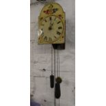 German 'Wag on the wall' clock, the case painted with flowers against a white background 28 cm x