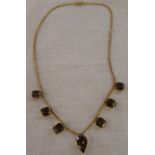 Tested as 9ct gold smokey quartz necklace, total weight 22.8g