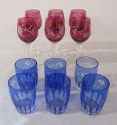 Set of 6 cranberry wine glasses and 6 blue glass tumblers