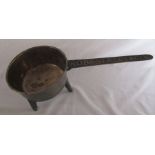 19th century bronze skillet, named to the handle Rob Street & Co, VI, raised on tripod legs L 35 cm