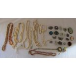 Various costume jewellery inc pearls, amber and brooches