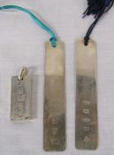 2 silver bookmarks Birmingham 2001 and 2001 weight 0.72 ozt and a silver ingot pendant London 1977