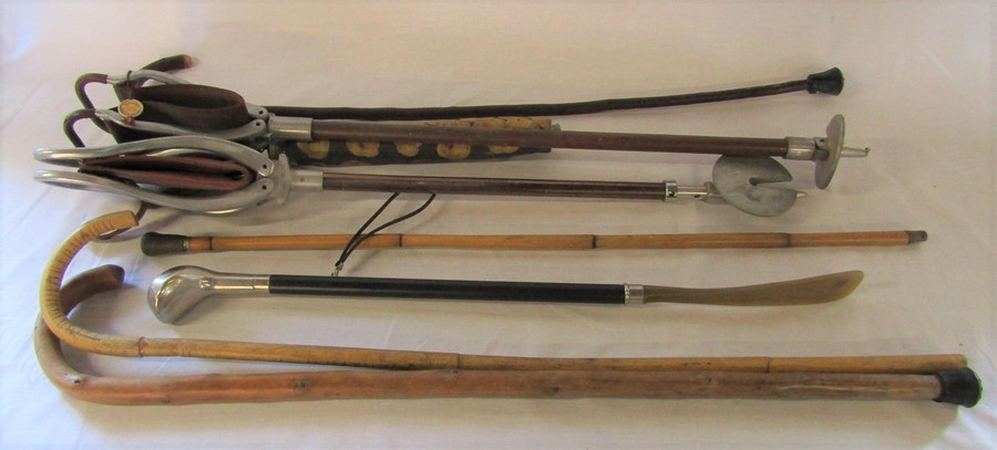 Selection of shooting sticks, walking canes etc