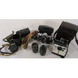 Praktica MTL 5B camera, Polaroid 1000 land camera and 2 lenses