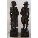 Pair of Dutch carved mahogany figurines of artisans H 45 cm