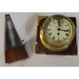 Metronome and a Sestrel brass cased bulk head clock