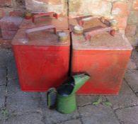 4 petrol cans and an oil can