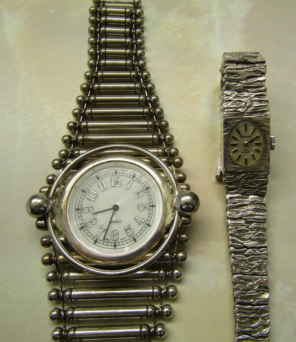 Silver Accurist 17 jewel ladies wristwatch London 1978 total weight 1.23 ozt and a modern white