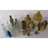 Various stoneware and glass bottles inc C W Rysdale Boston