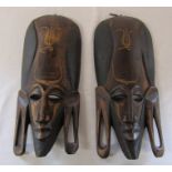 2 carved wooden African masks H 40 cm