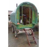 Early 20th century open-lot gypsy caravan / vardo with canvas top, hand painted interior &