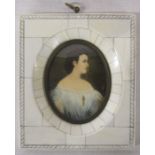 Reproduction portrait miniature of a young woman, signed, in ivory effect frame 12 cm x 14 cm (