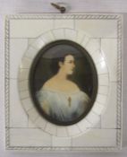 Reproduction portrait miniature of a young woman, signed, in ivory effect frame 12 cm x 14 cm (