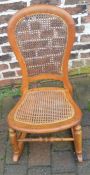 Small cane seated rocking chair