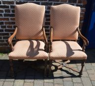 Pair of oak open arm chairs in the 17th century style with x stretchers and bun feet