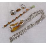 Various silver and white metal jewellery with amber stones