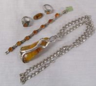 Various silver and white metal jewellery with amber stones
