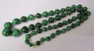 String of malachite beads weight 104g