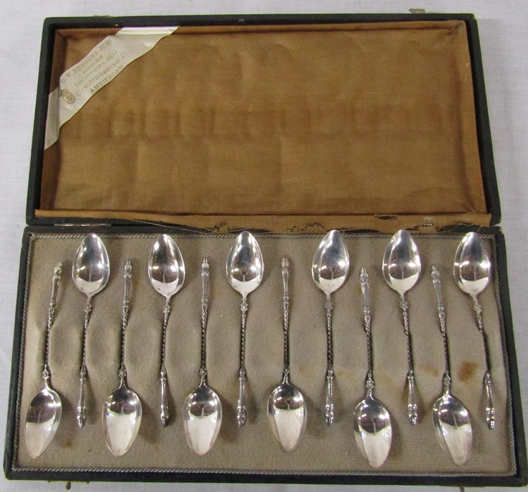 Cased set of 12 Dutch silver teaspoons marked 830 hoof design to handle, weight 3.64 ozt