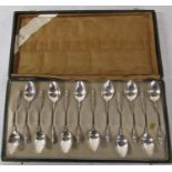 Cased set of 12 Dutch silver teaspoons marked 830 hoof design to handle, weight 3.64 ozt