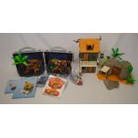 Playmobil pirate set in a case, a hut & a cave