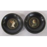 Reproduction portrait miniatures of a young man and woman in a black lacquered circular frames, both