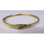 9ct gold ruby and diamond chip bangle weight 7.3 g D 6 cm
