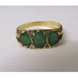 9ct gold 3 stone emerald and diamond chip ring size V weight 3.5 g (one diamond chip missing)