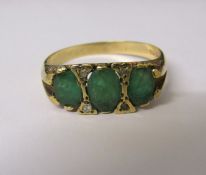 9ct gold 3 stone emerald and diamond chip ring size V weight 3.5 g (one diamond chip missing)