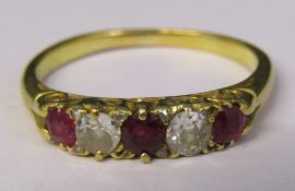 Tested as 18ct gold 5 stone ruby and diamond ring (ruby 0.12ct each, diamond 0.12ct each) size O