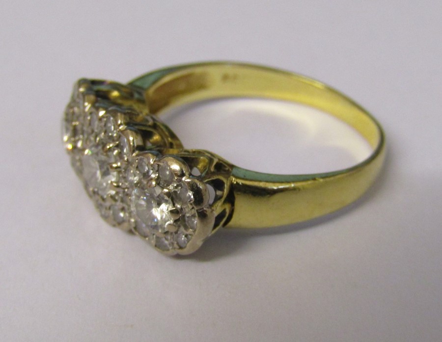 Tested as 18ct gold diamond trilogy ring, central diamond 0.33 ct, outer diamonds 0.15 ct and - Image 3 of 4
