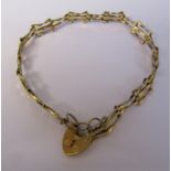 9ct gold gate bracelet with locket and safety chain weight 3.2 g