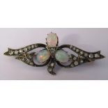 Tested as 18ct gold diamond and opal brooch weight 4.4 g L 45 mm (opal size 6 mm x 5 mm each)