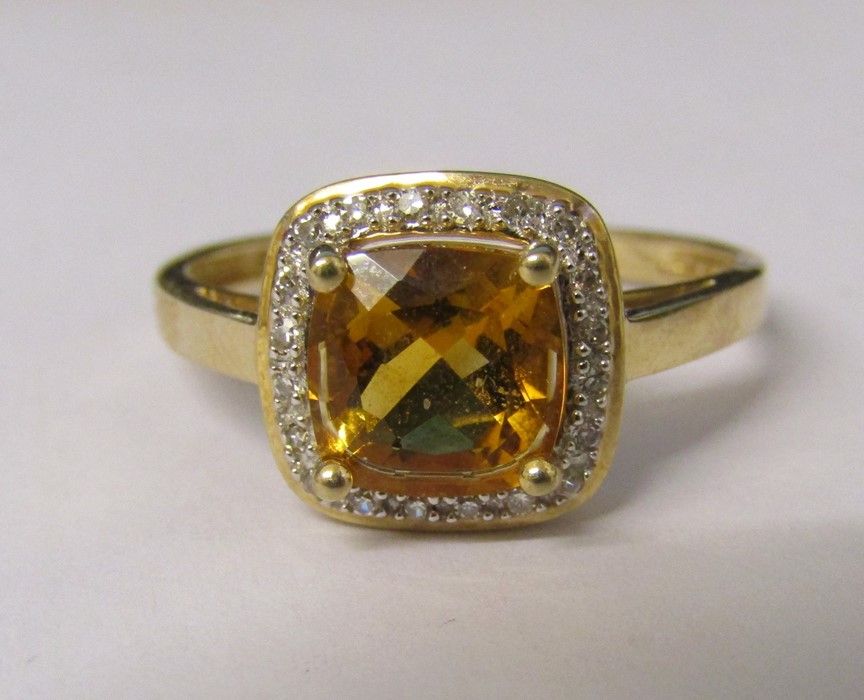 9ct gold citrine and diamond chip ring size U/V weight 3.6 g (citrine 8 mm x 8 mm)