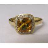 9ct gold citrine and diamond chip ring size U/V weight 3.6 g (citrine 8 mm x 8 mm)