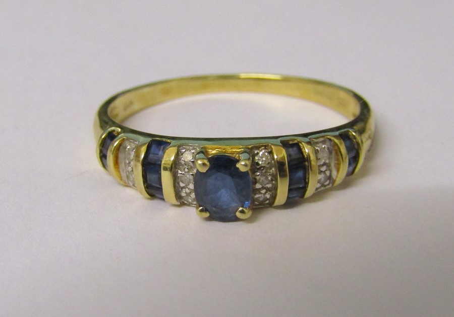 14ct gold diamond and sapphire ring size U weight 2.8 g