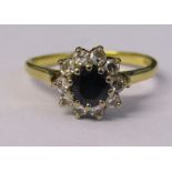 18ct gold sapphire and diamond cluster ring Sheffield 1904 weight 4.1 g (sapphire 0.75 ct, total