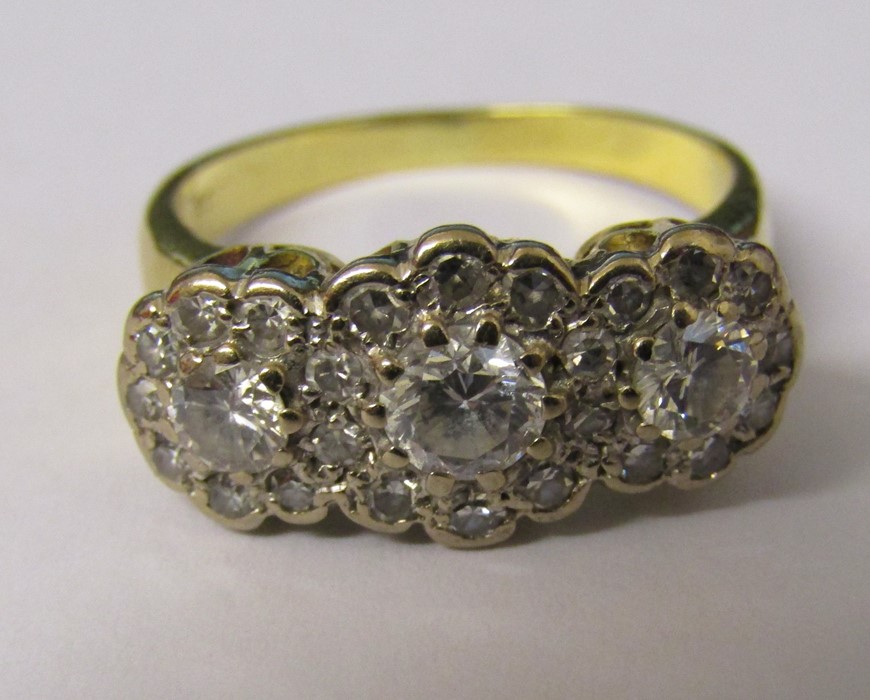 Tested as 18ct gold diamond trilogy ring, central diamond 0.33 ct, outer diamonds 0.15 ct and - Image 4 of 4