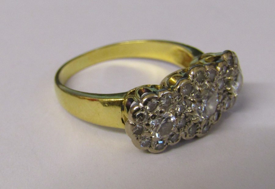 Tested as 18ct gold diamond trilogy ring, central diamond 0.33 ct, outer diamonds 0.15 ct and - Image 2 of 4