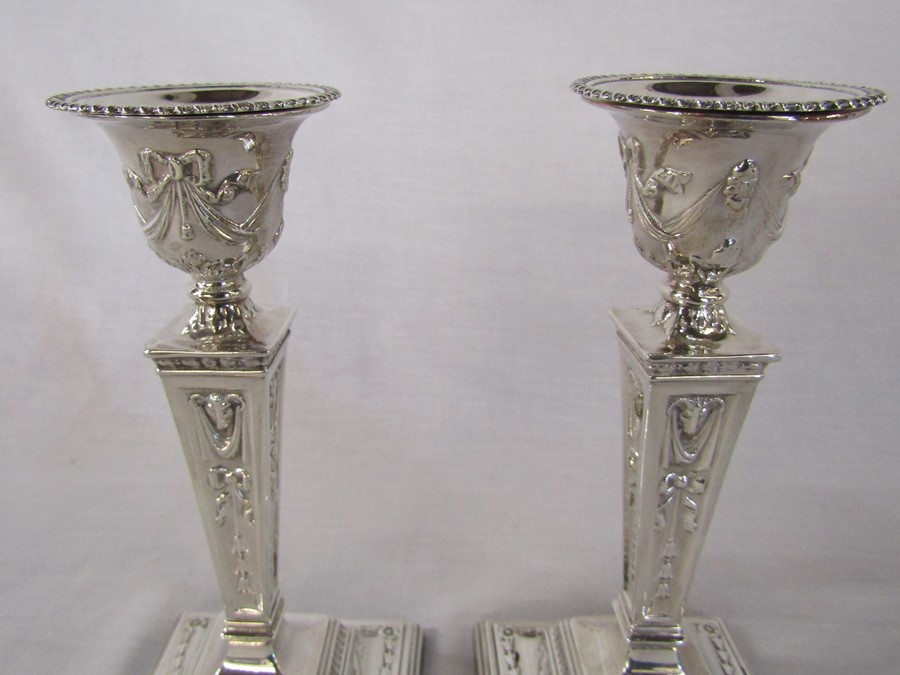 Pair of ornate silver candlesticks Birmingham 1973 (weighted base) maker S J Rose & Son H 19 cm - Image 2 of 2