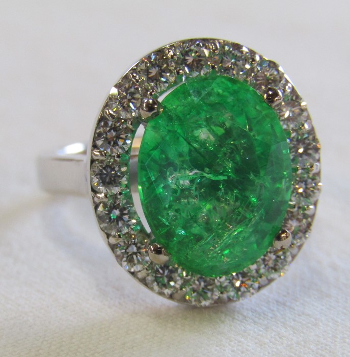 18ct gold emerald and diamond cluster ring, emerald 5.6 ct (11 mm x 13 mm) diamond total 1.00 ct,