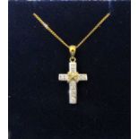 18ct white, yellow gold and diamonds cross pendant on an 18ct yellow gold chain total weight 5.3