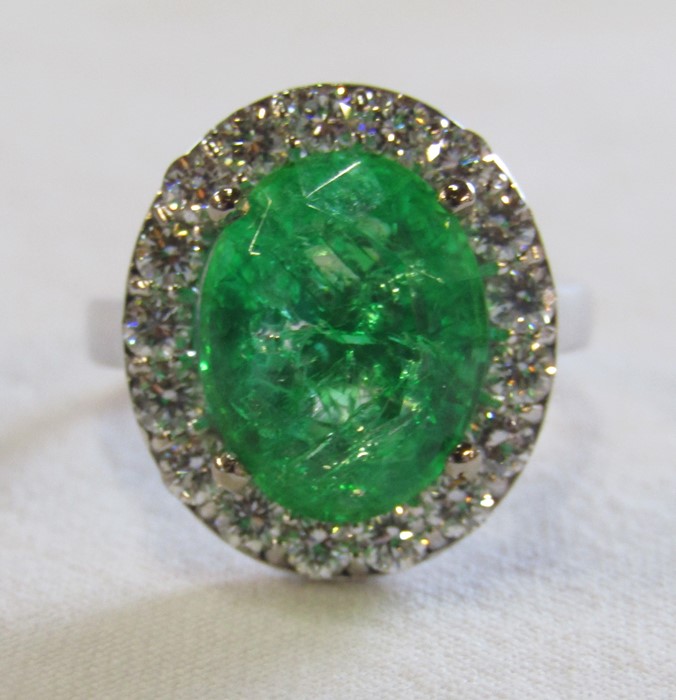 18ct gold emerald and diamond cluster ring, emerald 5.6 ct (11 mm x 13 mm) diamond total 1.00 ct, - Image 3 of 9
