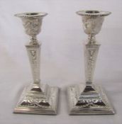 Pair of ornate silver candlesticks Birmingham 1973 (weighted base) maker S J Rose & Son H 19 cm